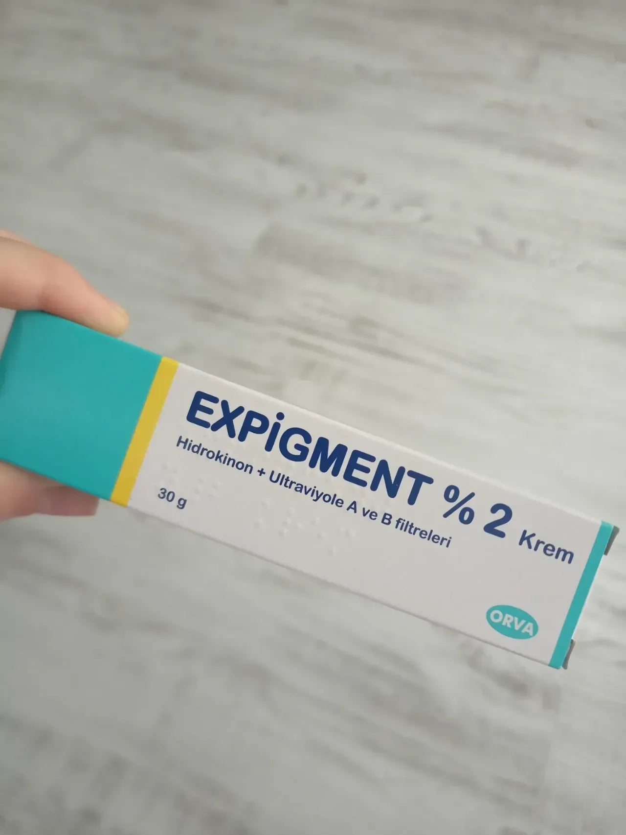 Expigment %2 cream packaging, hydroquinone skin bleaching cream expigment, 30 g tube for skin lightening.